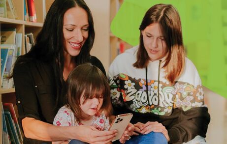 Lisa Rantucci with a girl discussing