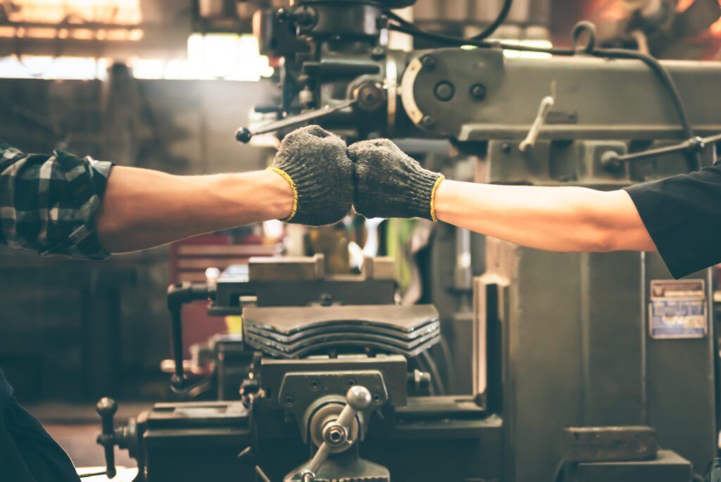 Two mates doing fist bump