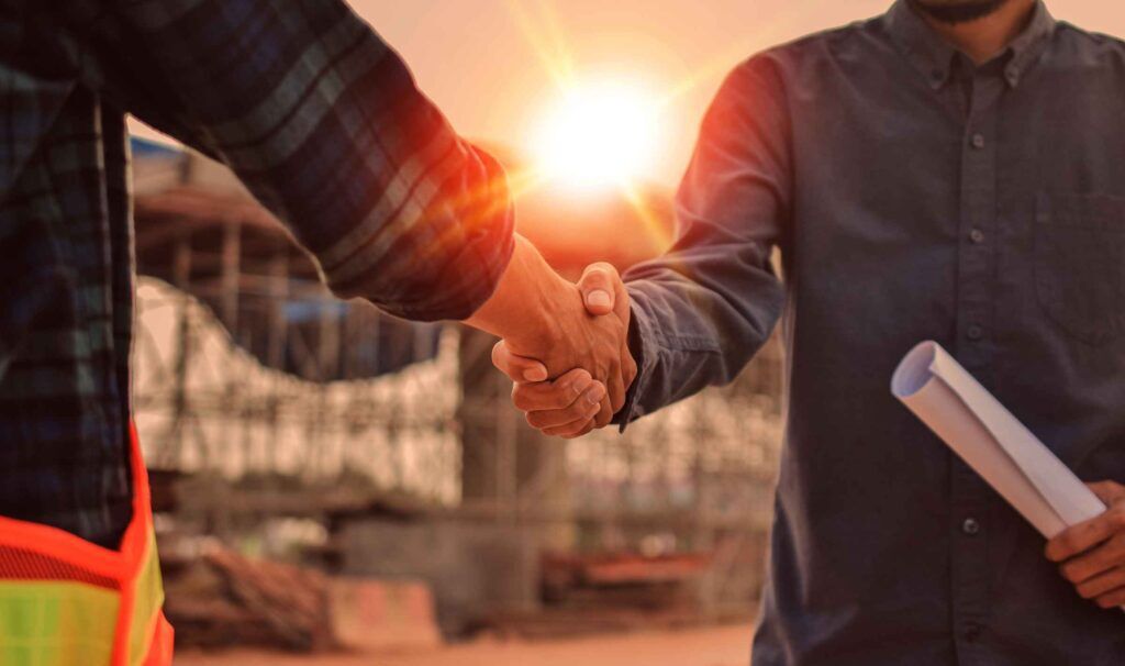 An official handshake after a deal is completed
