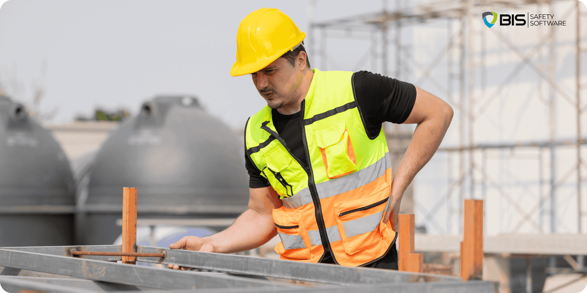 A Worker having a back pain at the jobsite