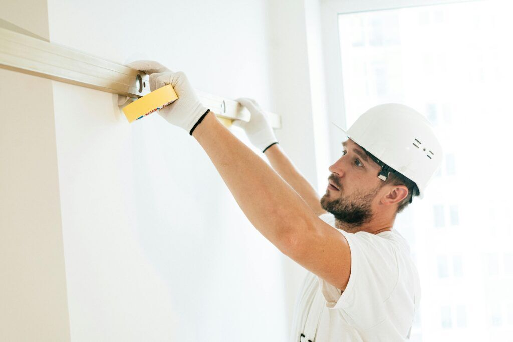 A car painter at work in a new home construction