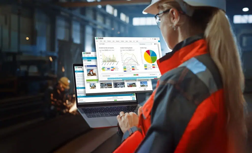 Canadian worker reviewing safety stats on a 6S dashboard display